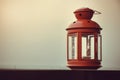 Red retro lamp at terrace with sunset light , vintage style Royalty Free Stock Photo