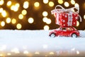 Red retro toy car delivering Christmas or New Year gifts Royalty Free Stock Photo