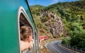 Red retro train in Bulgaria mountains
