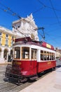 Red retro tram Commerce Square in Lisbon Royalty Free Stock Photo