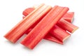 Red rhubarb stems\' cuts isolated on white background Royalty Free Stock Photo