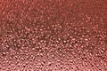 Red ribbed glass surface. Abstract background.