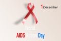 red ribbon. AIDS awareness sign. World HIV Day symbol.