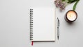 A red ribbon bookmark is visible on the notebook s left edge Royalty Free Stock Photo