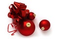 Red ribbon bow and christmas balls isolated on white background Royalty Free Stock Photo