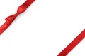 Red ribbon bow composition isolated on white background with shadow Royalty Free Stock Photo