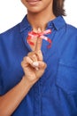 Red, ribbon and bow on finger for reminder of event, commitment or sign remember a task. Attention, symbol and icon on Royalty Free Stock Photo