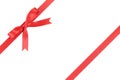Red ribbon with bow for packaging with tails Royalty Free Stock Photo