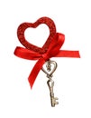 Red ribbon, glitter heart and a key Royalty Free Stock Photo