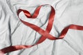 Red ribbon lined heart