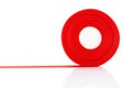 Red ribbon Roll isolated Royalty Free Stock Photo