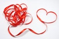 Red ribbon and snarl Royalty Free Stock Photo