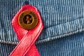 A red ribbon is a symbol of support for people with AIDS and HIV/