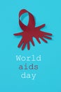 Red ribbon and text world aids day