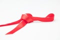 Red ribbon to make ties in Christmas gifts Royalty Free Stock Photo