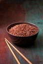 Red rice in a ceramic bowl Royalty Free Stock Photo