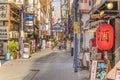 Red rice paper lantern with japanese kanji sake which mean Alcool on the front of an restaurant in the shopping street from the Royalty Free Stock Photo