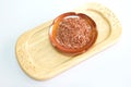 Red rice on wooden container Royalty Free Stock Photo