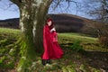 Red riding hood with lantern.