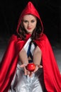 Red Riding Hood in the winter forest Royalty Free Stock Photo