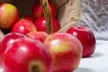 Red ripe apples in a basket