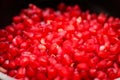 Red ripe pomegranate seeds closeup. health food. beautiful background texture of the seeds of the pomegranate. Wallpaper design.