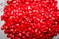 Red ripe pomegranate seeds closeup. health food. beautiful background texture of the seeds of the pomegranate. Wallpaper design.