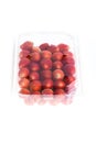 Red ripe strawberry in plastic box of packaging, isolated Royalty Free Stock Photo