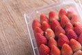 Red ripe strawberry in plastic box of packaging Royalty Free Stock Photo