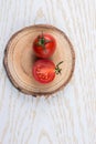 Red ripe tasty fresh cherry tomatos cut in half Royalty Free Stock Photo