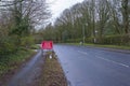 A Red Road Ahead Closed Sign