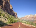 Red road with beautiful view in Zion National Park, USA Royalty Free Stock Photo