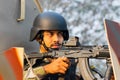 Indian soldier - a masked sharp shooter with a machine gun