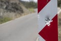 Red road traffic sign full of bullet holes. Close up Royalty Free Stock Photo