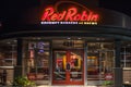 Red Robin fast food restaurant location at night entrance and sign