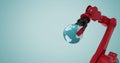 Red robot claw holding globe against light blue background