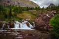 Red Rock Falls at Many Glacier, Glacier National Park Royalty Free Stock Photo