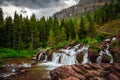 Red Rock Falls at Many Glacier, Glacier National Park Royalty Free Stock Photo