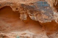 Red rock formation on canyon wall Royalty Free Stock Photo