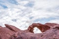 Red rock and a natural arch in the Valley of Fire, Nevada Royalty Free Stock Photo