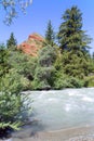 Red Rock over the fast mountain river Royalty Free Stock Photo