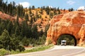 Red rock tunnel Near Bryce Canyon National Park. Royalty Free Stock Photo