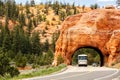 Red rock tunnel Near Bryce Canyon National Park. Royalty Free Stock Photo