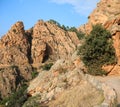 Red rocks of Badlands mountains called Calanques of Piana in Cor