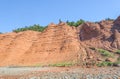 Red rocks of the Blomidon cliffs Royalty Free Stock Photo