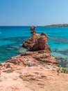 Red rocks at the edge of the beach of Cea near Arbatax Sardinia, Italy