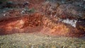 Red rocks in mining area rich with iron and copper ore Royalty Free Stock Photo