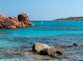 The red rocks in the northern edge of the long beach called Spiaggia di Cea, near Arbatax Sardinia, Italy