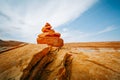 Red rocks stone balance on the beach close to Lake Powell, beautiful cloudy sky background with copy space Royalty Free Stock Photo