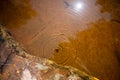 red rocks in a stream iof tannin water Royalty Free Stock Photo